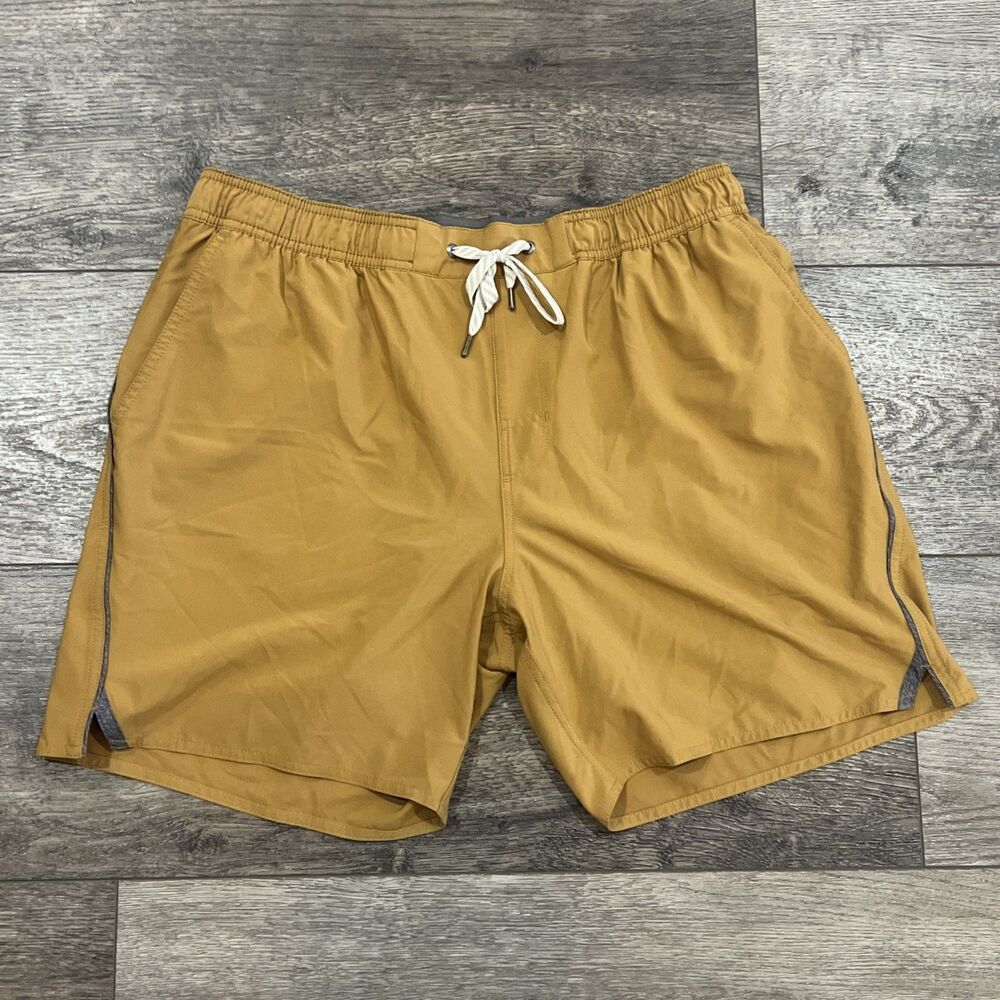 Vuori Banks Shorts Mens XL Mustard Gold Athletic Swim Hybrid Zip Pocket
